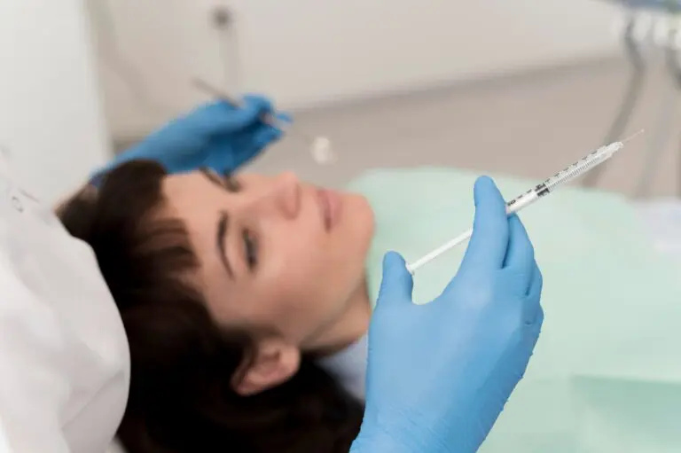 A woman on a medical chair is prepped for a cosmetic injection at BeSpoke Orthodontics in Burtonsville, MD.